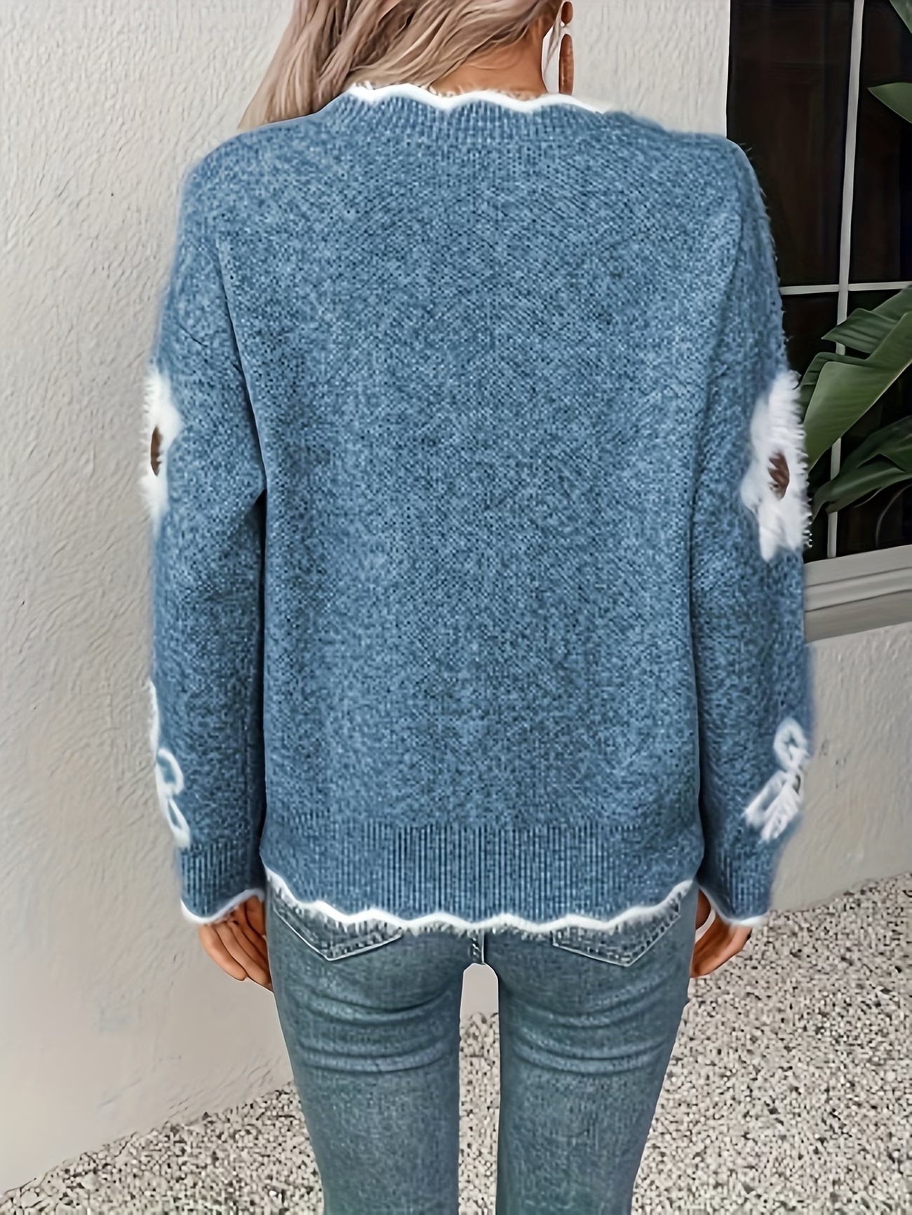 Maglione invernale con stile floreale