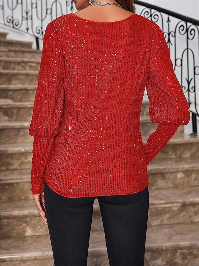 Blusa invernale elegante con paillets